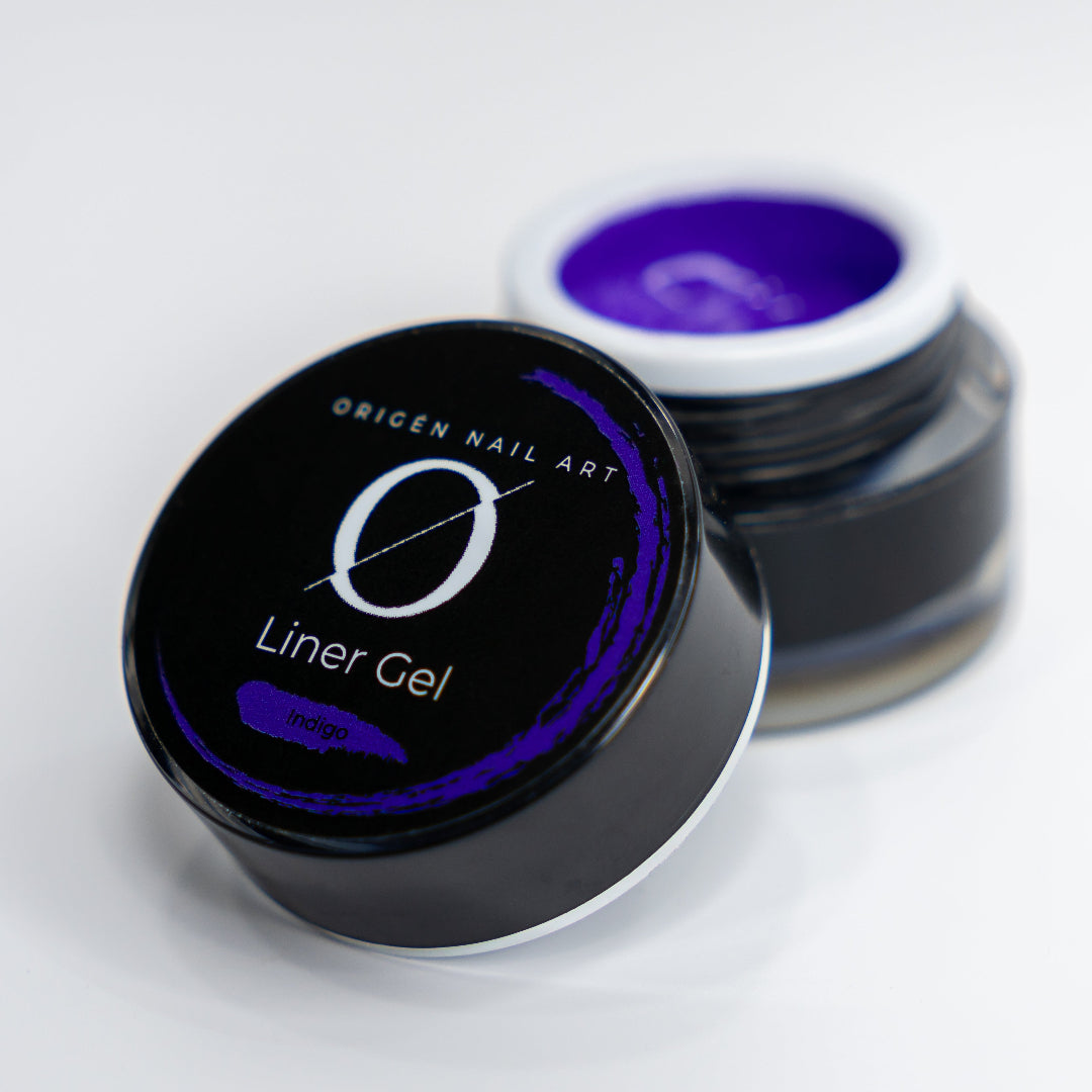 A container of ORIGÉN Nail Art Liner Gel with the lid off, showing the indigo-colored gel inside.